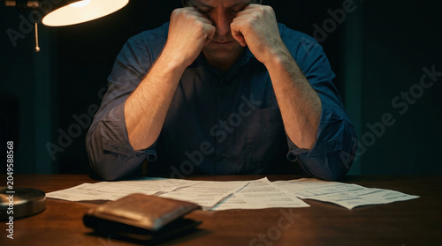 Financial stress from inflation, tired person with bills