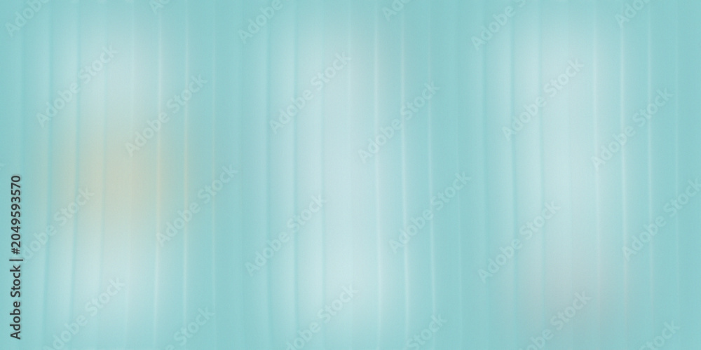 Obraz premium Soft light rays shining through light blue watery background