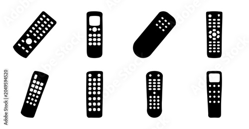 Black and white remote controls set - Eight different styles of black and white remote controls arranged in a clean, organized layout for design use.