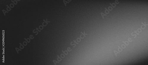 a gray gradient background with a vignette effect and no objects or people present in the scene