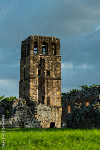 Panama viejo historical cathedral tower ruins stand against a dramatic blue sky, representing centuries of history and the architectural heritage of this ancient site in Panama - stock photo