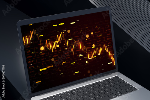 Glowing financial candlestick chart on a laptop screen displaying dynamic mar...