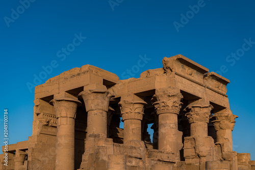 Vászonkép Kom Ombo Temple Colonnade Against Blue Sky, Egypt