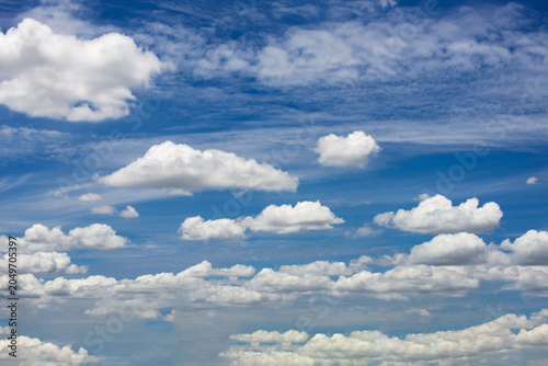 beautiful blue sky and white fluffy cloud horizon outdoor for background.