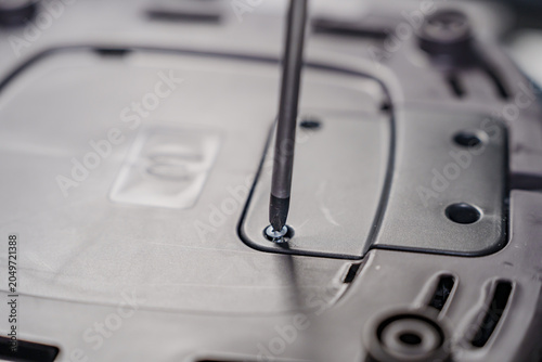Tightening a Screw on Electronic Device Housing