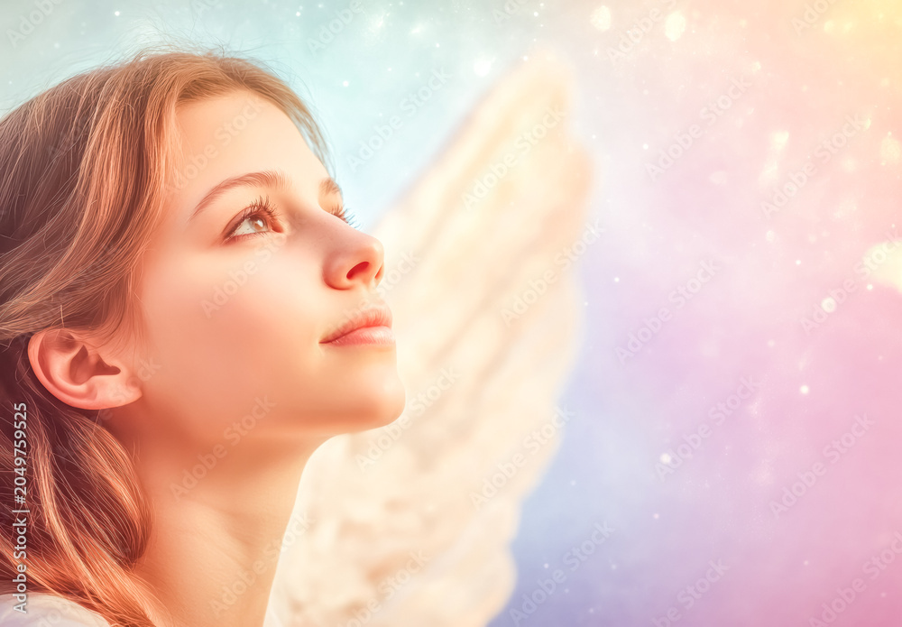 Obraz premium An illusion draing of winged angel among glowing clouds at night. Stars and large feathers fill the blue sky.