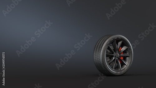 Quadro em tela Sports car wheel with matte black alloy rim, detailed rubber tire tread, and bright red brake caliper