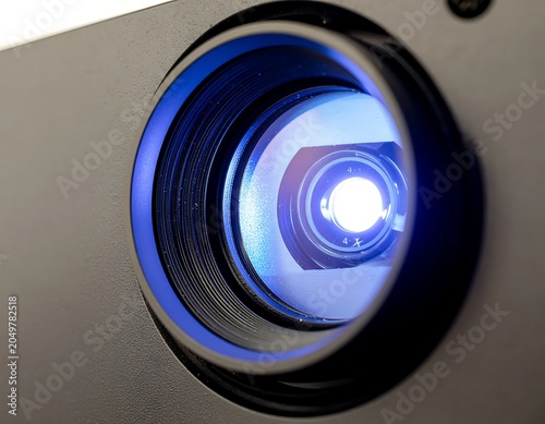 Close-up View of Camera Lens with Blue Light.