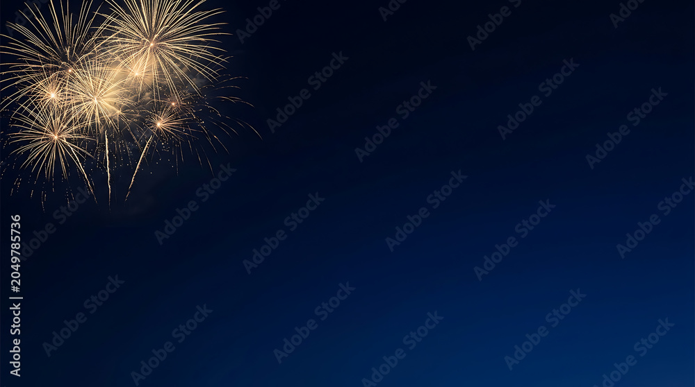 Fototapeta premium Golden Fireworks Exploding Against a Deep Blue Night Sky for New Year Celebration Background