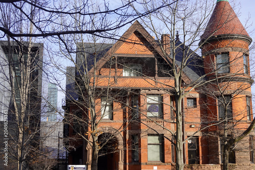 Canvas Print Victorian Brick House With Turret And Gables