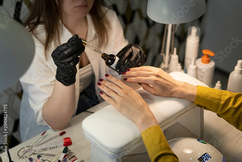 Foto nail treatment with liquid oil