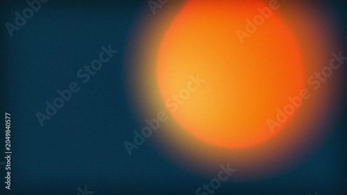 Abstract animation of a glowing orange sun sphere on dark blue background