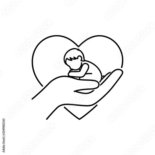 Hand holding a sleeping baby inside a heart icon