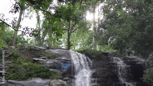 A mountain river that flows through rocky banks in the mountains.