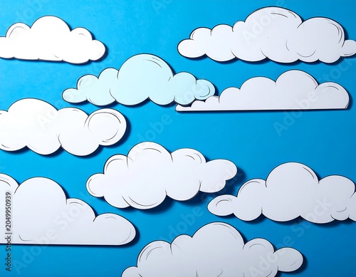 A blue background with various white cloud shapes cut out