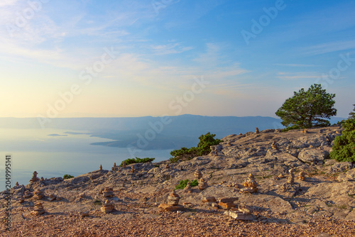 Breathtaking unique view of the Adriatic Sea and the Croatian island of Hvar from the height of Vidova mountain at dawn