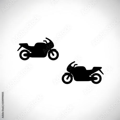 Black silhouette of two bicycles on white background.