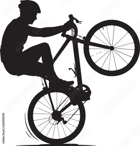 Foto Cyclist performing a wheelie trick on a mountain bike silhouette with silhouette