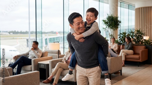 Father giving daughter piggyback ride in luxury airport lounge