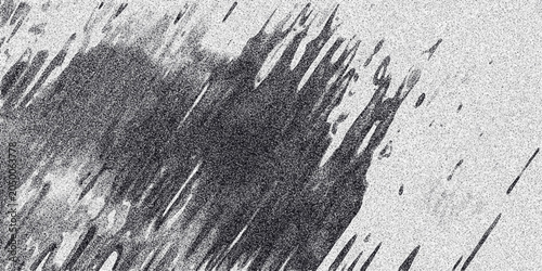 Abstract monochrome textured background with diagonal streaks and grainy noise creating a dynamic and artistic visual effect