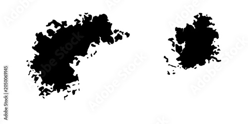 Fotografi Abstract black ink splotches with irregular, artistic edges stand out against a clean white backdrop, suggesting organic forms or creative splatters