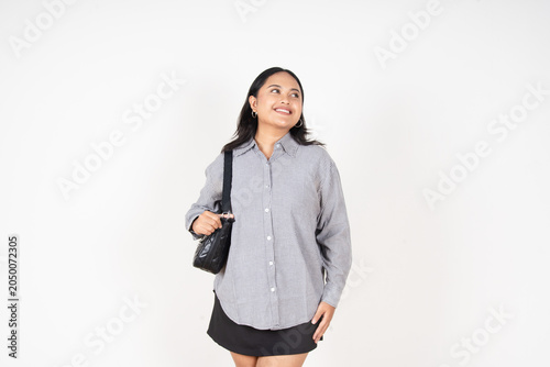 Fotografía Young woman gestures with hands, puckered lips