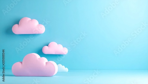 Pink toy clouds against a soft blue wall background.