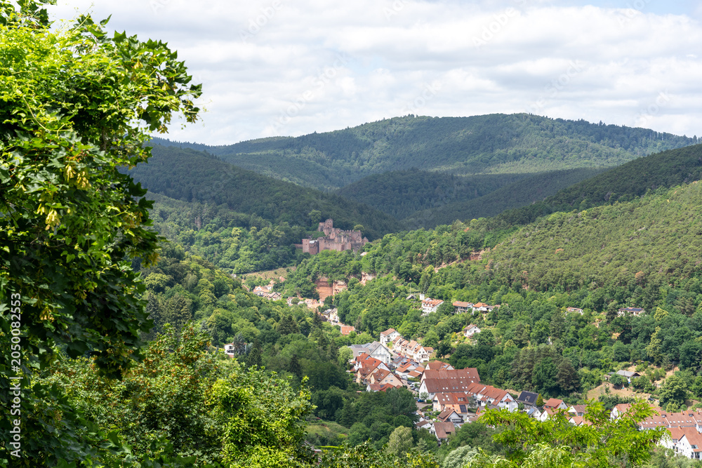 Fototapeta premium Hardenburg Castle Overlooking Bad Dürkheim Valley With Forested Hills and Village Panorama