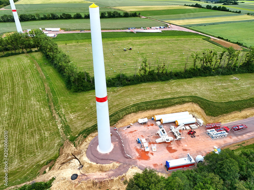 Aerial View of Wind Turbine Construction Site in Green Countryside