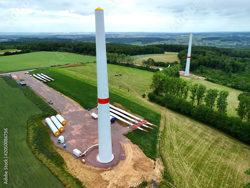 Aerial View of Wind Turbine Construction Site in Green Countryside