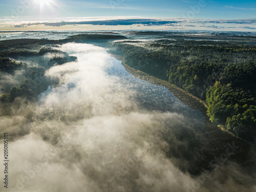 Aerial view of fog over lak...