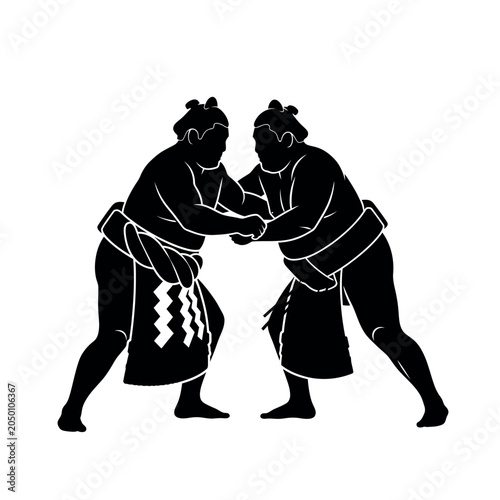Bild auf Leinwand Sumo wrestlers grappling in a match.