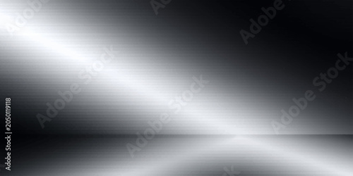 Obraz na płótnie Polished metallic surface reflecting a dramatic diagonal light beam, creating a sleek and modern abstract background with a subtle floor reflection