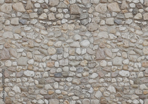 Seamless cobble stone wall texture background. Natural river stone masonry wall backdrop.