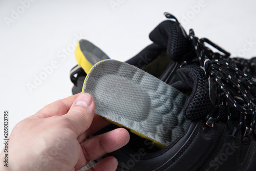 Orthopedic shoe insoles. Shoe accessories.