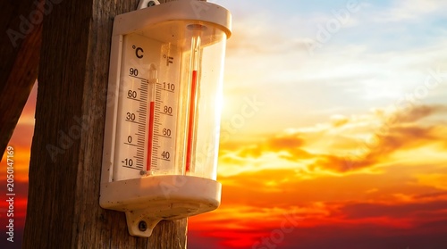 Analog thermometer showing temperature reading