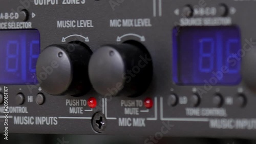 Front control panel of the audio amplifier with level controls and display. 
