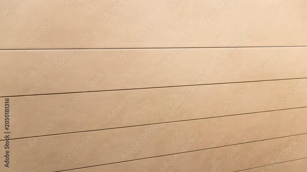 Fototapeta premium Minimalist Beige Wall Paneling with Modern Horizontal Linear Cladding Texture. Background