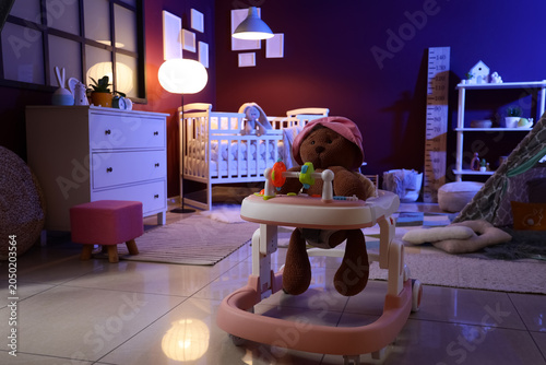 Baby walker with plush bear...