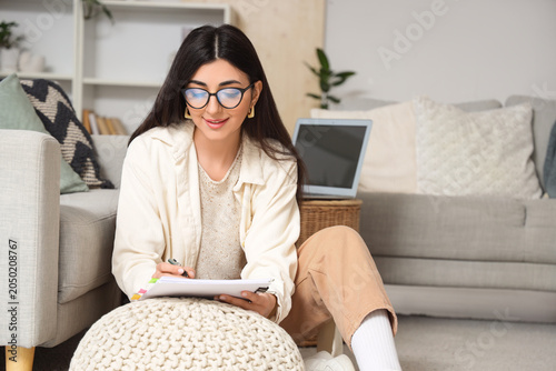 Female screenwriter writing...