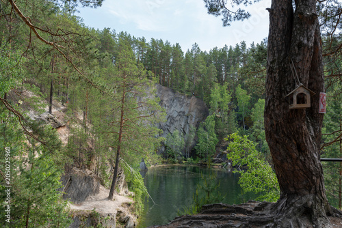 Foto Talkov Kamen or Talkov Stone is flooded quarry that formed lake in Sysert district, Sverdlovsk region, Russia