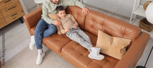 Happy father and his son wi...