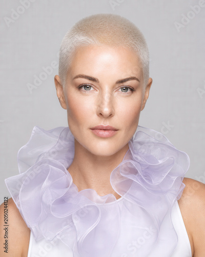 Platinum Buzz Cut Woman With Lavender Ruffle Collar