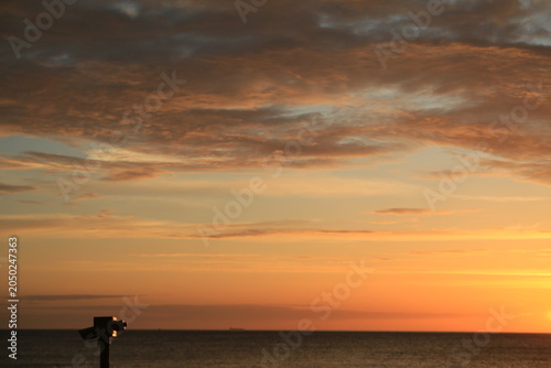 Sundown with dark clouds