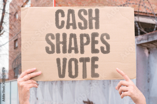 Fotografia "Cash shapes vote" Money determines electoral outcomes