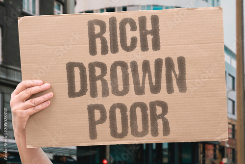 Bild auf Leinwand "Rich drown poor" Wealthy voices silence ordinary citizens