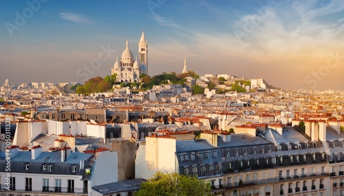 sacre coeur basilica overlooks paris rooftops in soft spring morning light