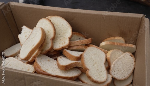 Cuadro en lienzo Bakery waste. Bread loss. Uneaten discarded bread. Mold on bread