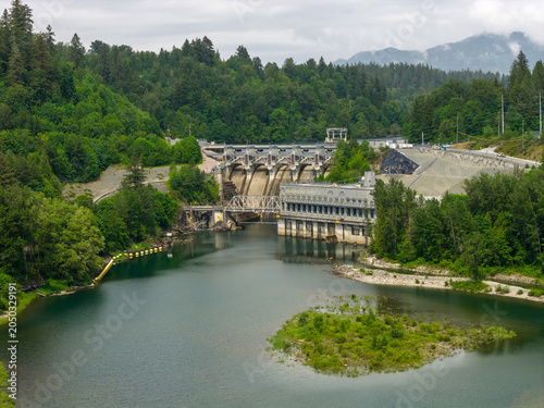 Hydroelectric Dam and Reservoir at Mission BC Canada Surrounded by Forested Mountains and River