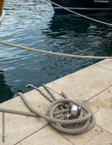 Canvastavla Close-up of mooring lines securing a luxury yacht at a marina